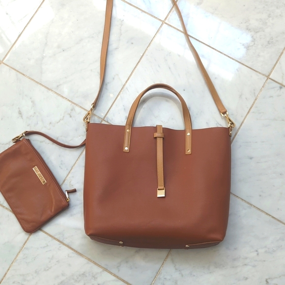 Tiffany & Co. Handbags - Tiffany leather reversible bag with wristlet Excellent condition